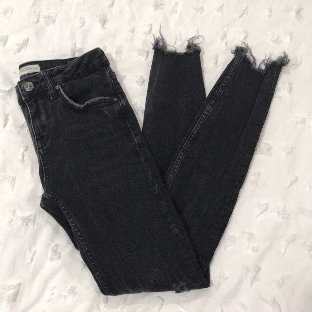 Denim pants frayed bottoms